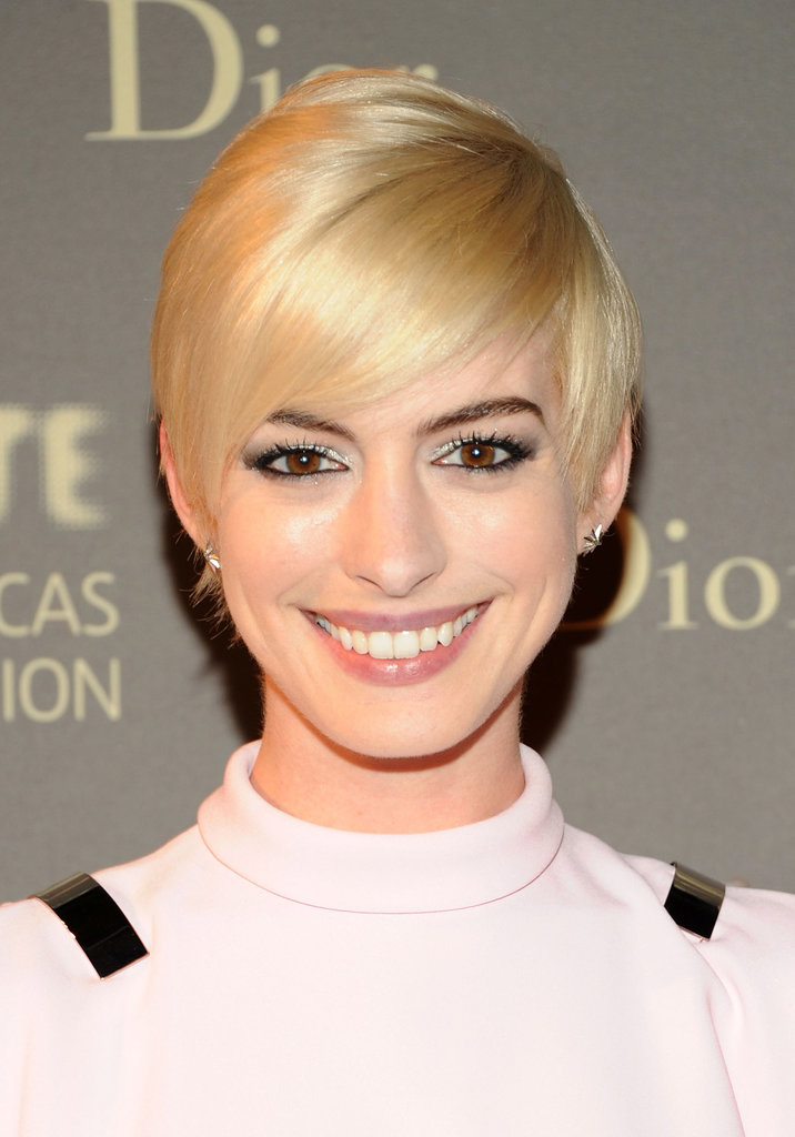 Anne Hathaway notoriously cut her hair on camera for her role as Fantine in Les Misérables and then shocked everyone when she dyed her crop platinum for the Met Gala, only to color it back to brunette just weeks later.
Anne Hathaway notoriously cut her hair on camera for her role as Fantine in Les Misérables and then shocked everyone when she dyed her crop platinum for the Met Gala, only to color it back to brunette just weeks later.