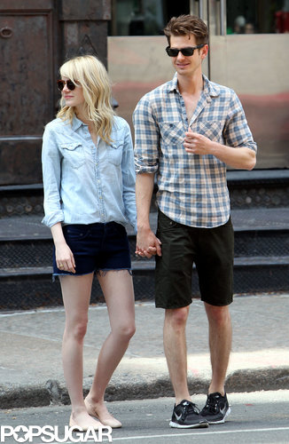 Emma Stone and Andrew Garfield stood hand in hand on an NYC street.
Emma Stone and Andrew Garfield stood hand in hand on an NYC street.