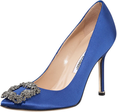 Adhering to the "something blue" — and the "something new" — wedding tradition, we couldn't help but fall in love with this gorgeously bejeweled Manolo Blahnik cobalt blue satin pumps ($965) that Carrie Bradshaw bought for her own wedding.
Adhering to the "something blue" — and the "something new" — wedding tradition, we couldn't help but fall in love with this gorgeously bejeweled Manolo Blahnik cobalt blue satin pumps ($965) that Carrie Bradshaw bought for her own wedding.
