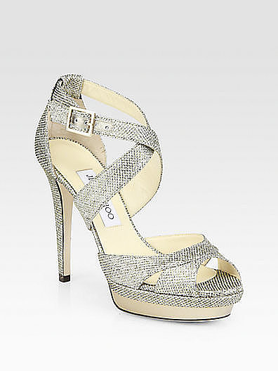 What bride doesn't want her toes to sparkle on her big day? The perfect way to do so is with these Jimmy Choo glitter platform sandals ($895).
What bride doesn't want her toes to sparkle on her big day? The perfect way to do so is with these Jimmy Choo glitter platform sandals ($895).