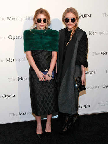 Twinning combo: So bright, they've gotta wear shades. Ashley and Mary-Kate accessorized their March 2011 Metropolitan Opera looks with matching oversize round sunglasses.
Ashley kept cozy in an emerald-green fur stole over her jacquard sheath dress.
Mary-Kate topped her sheer, polka-dot maxi dress with a metallic shawl-collar coat.
Twinning combo: So bright, they've gotta wear shades. Ashley and Mary-Kate accessorized their March 2011 Metropolitan Opera looks with matching oversize round sunglasses.
Ashley kept cozy in an emerald-green fur stole over her jacquard sheath dress.
Mary-Kate topped her sheer, polka-dot maxi dress with a metallic shawl-collar coat.