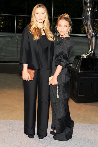 Elizabeth Olsen, in The Row, with Mary-Kate Olsen, in vintage Issey Miyake, at the 2013 CFDA Awards.
Source: Billy Farrell/BFAnyc.com
Elizabeth Olsen, in The Row, with Mary-Kate Olsen, in vintage Issey Miyake, at the 2013 CFDA Awards.
Source: Billy Farrell/BFAnyc.com