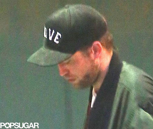 Robert Pattinson wore a baseball cap.
Robert Pattinson wore a baseball cap.