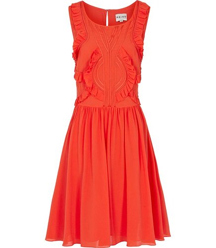 The bold orange color of this ruffled Reiss style ($340) is sure to stand out.
The bold orange color of this ruffled Reiss style ($340) is sure to stand out.