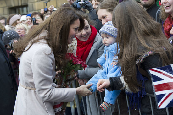 Kate Middleton was still keeping her pregnancy a secret on Nov. 28, 2012, when she was joined by Prince William to visit their namesake town, Cambridge.
Kate Middleton was still keeping her pregnancy a secret on Nov. 28, 2012, when she was joined by Prince William to visit their namesake town, Cambridge.