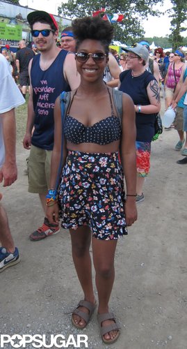 We spotted Danielle making her way into the festival and couldn't get enough of her retro-inspired look. Her anchor-print halter-top bikini offset the high-waisted floral skirt to perfection.
We spotted Danielle making her way into the festival and couldn't get enough of her retro-inspired look. Her anchor-print halter-top bikini offset the high-waisted floral skirt to perfection.