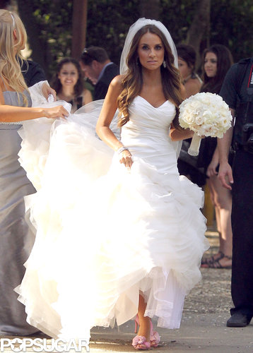 Angela Stacy carried a white bouquet.
Angela Stacy carried a white bouquet.