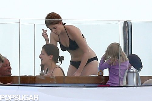 Princess Beatrice wore a black bikini while hanging out on a yacht in Antibes, France, back in June. Ashton Kutcher and Mila Kunis were also spotted in Beatrice's boat group.
Princess Beatrice wore a black bikini while hanging out on a yacht in Antibes, France, back in June. Ashton Kutcher and Mila Kunis were also spotted in Beatrice's boat group.