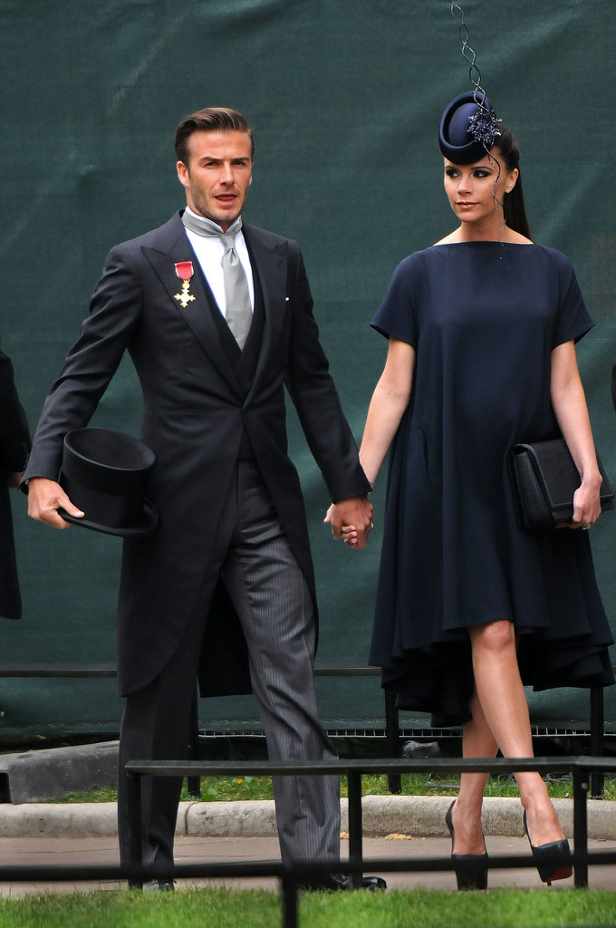 Victoria Beckham made an entrance in a high-low dress and matching navy fascinator at the April 2011 royal nuptials of Prince William and Kate Middleton in London. David was dapper too! Mimic Victoria's regal style by matching a loose-fitting dress with an over-the-top hat.
Victoria Beckham made an entrance in a high-low dress and matching navy fascinator at the April 2011 royal nuptials of Prince William and Kate Middleton in London. David was dapper too! Mimic Victoria's regal style by matching a loose-fitting dress with an over-the-top hat.