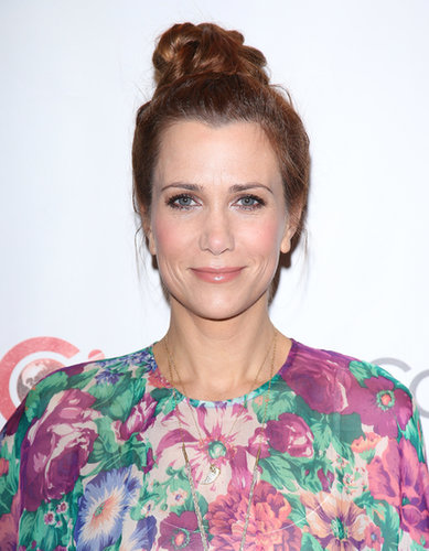 Kristen Wiig swept her hair up into a precarious topknot that will keep your hair color safe from chlorine when you take a dip this Summer.
Kristen Wiig swept her hair up into a precarious topknot that will keep your hair color safe from chlorine when you take a dip this Summer.