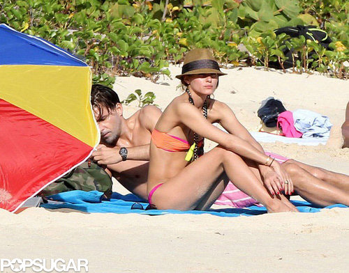 Olivia Palermo slipped into a brilliant colorblocked, bandeau bikini, then adorned her beach look with a straw fedora and long, layered necklaces.
Olivia Palermo slipped into a brilliant colorblocked, bandeau bikini, then adorned her beach look with a straw fedora and long, layered necklaces.