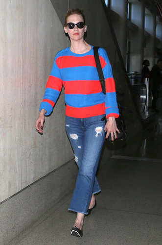 You don't have to be traveling to re-create January Jones's airport look. Just find a bold red-and-blue striped top, then add distressed denim for a cool finish.
You don't have to be traveling to re-create January Jones's airport look. Just find a bold red-and-blue striped top, then add distressed denim for a cool finish.