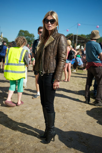 Kate Moss maintained her cool-girl reputation in a shearling leather jacket, black skinny denim, black leather boots, and dramatic cat-eye sunglasses at the 2013 Glastonbury Festival.
Kate Moss maintained her cool-girl reputation in a shearling leather jacket, black skinny denim, black leather boots, and dramatic cat-eye sunglasses at the 2013 Glastonbury Festival.