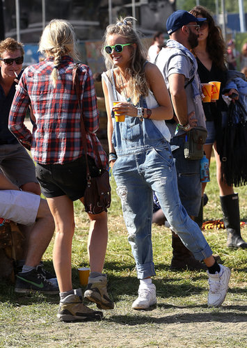 Rumored girlfriend to Prince Harry Cressida Bonas showed off a Glastonbury look we can't quite picture Kate Middleton in: cuffed overalls, white sneakers, and neon green shades.
Rumored girlfriend to Prince Harry Cressida Bonas showed off a Glastonbury look we can't quite picture Kate Middleton in: cuffed overalls, white sneakers, and neon green shades.