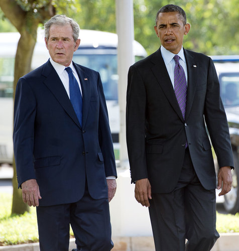 President Obama and former President George W. Bush walked together while they were both in Tanzania in July.
President Obama and former President George W. Bush walked together while they were both in Tanzania in July.