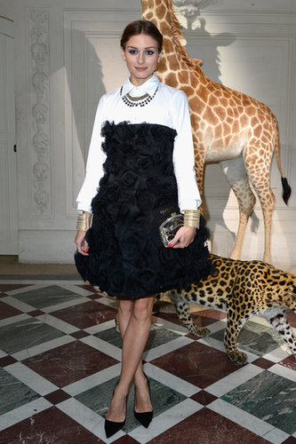 At the Valentino Haute Couture show in Paris, Olivia Palermo donned a little black strapless dress over a crisp white blouse and finished with a bevy of jewels.
At the Valentino Haute Couture show in Paris, Olivia Palermo donned a little black strapless dress over a crisp white blouse and finished with a bevy of jewels.