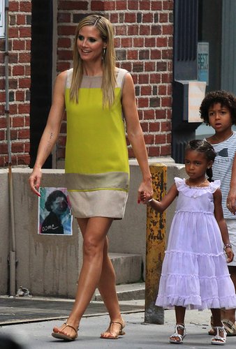 Heidi Klum showed off her feminine side in a chartreuse and champagne minidress and gold T-strap sandals in NYC.
Heidi Klum showed off her feminine side in a chartreuse and champagne minidress and gold T-strap sandals in NYC.
