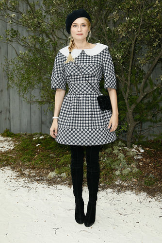 Diane Kruger showed her support for friend Karl Lagerfeld donning Chanel for the house's couture show earlier this year. The German actress wore a schoolgirl-inspired dress partnered with over-the-knee boots, a chic black beret, and classic shoulder bag.
Diane Kruger showed her support for friend Karl Lagerfeld donning Chanel for the house's couture show earlier this year. The German actress wore a schoolgirl-inspired dress partnered with over-the-knee boots, a chic black beret, and classic shoulder bag.