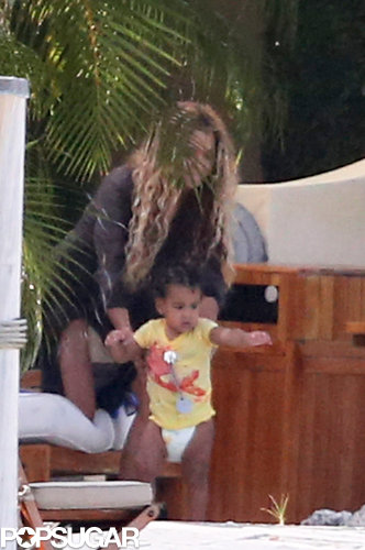 Beyoncé played by the pool with her daughter Blue.
Beyoncé played by the pool with her daughter Blue.