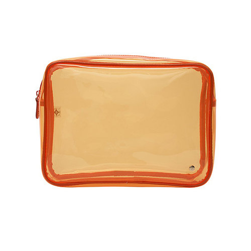 The bright orange color adds excitement to this Stephanie Johnson Miami Jumbo Zip Case ($46), which is sturdy enough to keep your favorite beauty buys from getting smashed in cargo.
The bright orange color adds excitement to this Stephanie Johnson Miami Jumbo Zip Case ($46), which is sturdy enough to keep your favorite beauty buys from getting smashed in cargo.