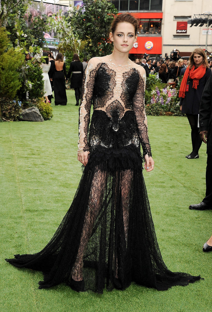 Stewart made a serious statement for the May 2012 premiere of Snow White and the Huntsman in London — she wore a gothic-inspired black lace Marchesa gown with a deceptively sheer bodice.
Stewart made a serious statement for the May 2012 premiere of Snow White and the Huntsman in London — she wore a gothic-inspired black lace Marchesa gown with a deceptively sheer bodice.