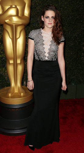 For an award ceremony in December 2012, Stewart chose a lace- and sequin-embellished Talbot Runhof gown and finished it off with classic black pumps and a dainty Cartier bracelet.
For an award ceremony in December 2012, Stewart chose a lace- and sequin-embellished Talbot Runhof gown and finished it off with classic black pumps and a dainty Cartier bracelet.