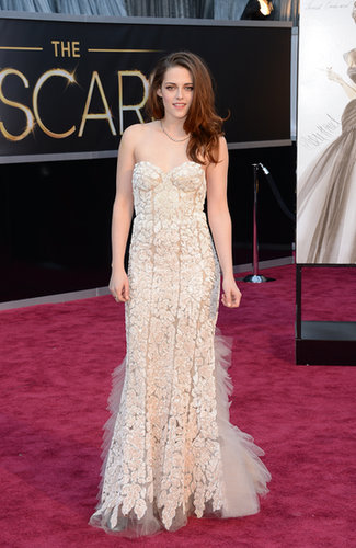 Stewart donned a pale blush Reem Acra gown featuring intricate lace detailing for the 2013 Oscars in February.
Stewart donned a pale blush Reem Acra gown featuring intricate lace detailing for the 2013 Oscars in February.