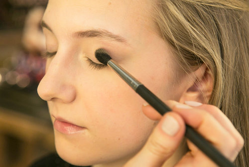 Heading back up to the eyes, Bettelli prepped the lids with Blot Powder ($24) to prevent greasy eyelids and eye shadow slippage.
She then applied a warm tawny eye shadow — Pro Longwear in Always Sunny ($21) — all over the lids, connecting it under the lower lids as well.
Heading back up to the eyes, Bettelli prepped the lids with Blot Powder ($24) to prevent greasy eyelids and eye shadow slippage.
She then applied a warm tawny eye shadow — Pro Longwear in Always Sunny ($21) — all over the lids, connecting it under the lower lids as well.