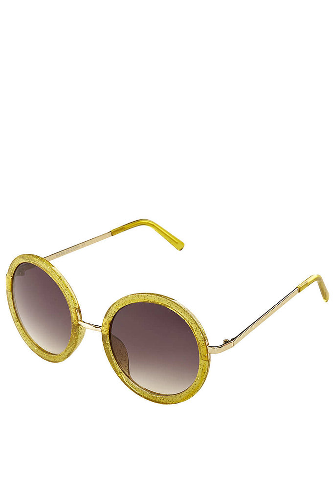 When it comes to sunglasses, glitter is in. Hop on the trend wagon with this Topshop pair ($32).
When it comes to sunglasses, glitter is in. Hop on the trend wagon with this Topshop pair ($32).