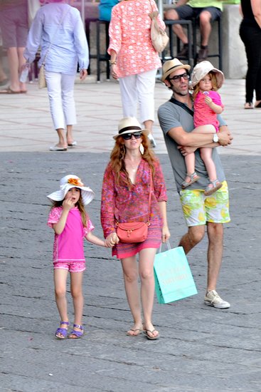 Sacha Baron Cohen and Isla Fisher walked through an Italian town.
Sacha Baron Cohen and Isla Fisher walked through an Italian town.