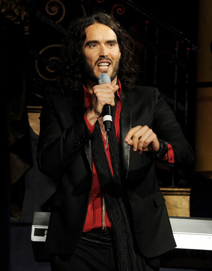 Russell Brand took some not-so-nice jabs at ex-wife Katy Perry during a July 2013 stand-up routine at London's Soho Theatre. During the show, he joked about how he considered becoming a monk after the couple's 2011 divorce, saying, "When you’re a monk, you’re not allowed to have sex with anyone. When you’re married, it’s one person. That’s one more than a monk. It’s not that different." About sleeping with Katy, he added, "I’d be having sex thinking, ‘Think of anyone, anyone else.'"
Russell Brand took some not-so-nice jabs at ex-wife Katy Perry during a July 2013 stand-up routine at London's Soho Theatre. During the show, he joked about how he considered becoming a monk after the couple's 2011 divorce, saying, "When you’re a monk, you’re not allowed to have sex with anyone. When you’re married, it’s one person. That’s one more than a monk. It’s not that different." About sleeping with Katy, he added, "I’d be having sex thinking, ‘Think of anyone, anyone else.'"