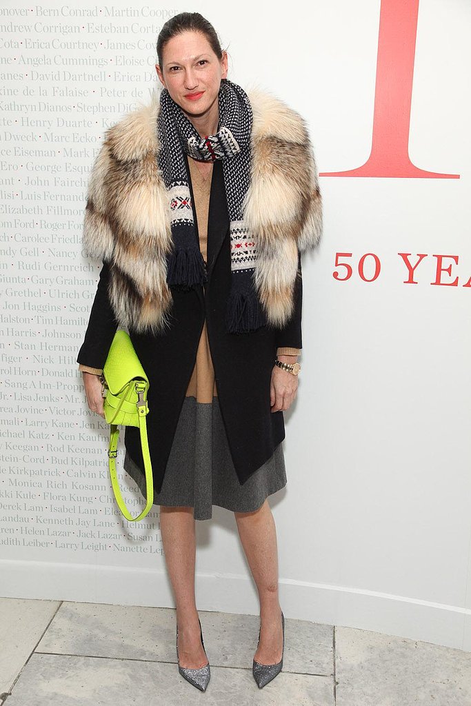 Fur and heels juxtaposed against a neon schoolboy satchel and knit scarf adds up to the sort of intrigue we've come to expect from the J.Crew chief.
Fur and heels juxtaposed against a neon schoolboy satchel and knit scarf adds up to the sort of intrigue we've come to expect from the J.Crew chief.