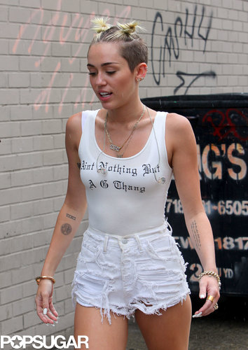 Miley Cyrus wore her hair in pigtails.
Miley Cyrus wore her hair in pigtails.