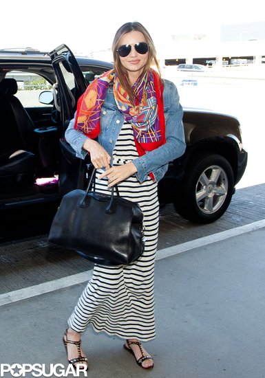 Miranda Kerr wore a striped maxi dress at LAX. Miranda Kerr wore a striped maxi dress at LAX.