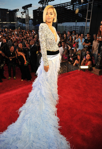 Rita Ora made a grand entrance in an embellished Alexandre Vauthier Fall 2013 Couture gown featuring a plunging neckline and an over-the-top feathery skirt and train.
Rita Ora made a grand entrance in an embellished Alexandre Vauthier Fall 2013 Couture gown featuring a plunging neckline and an over-the-top feathery skirt and train.