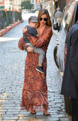 While on mommy duty, Miranda donned a paisley print maxi dress by Skaist Taylor with studded sandals and aviator sunglasses.
While on mommy duty, Miranda donned a paisley print maxi dress by Skaist Taylor with studded sandals and aviator sunglasses.