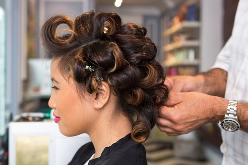 Continue curling your entire head and secure each section with duck bill clips to hold your pin curls. They should all be curling down, and the hair on top of your head should be curled away from your face.
Continue curling your entire head and secure each section with duck bill clips to hold your pin curls. They should all be curling down, and the hair on top of your head should be curled away from your face.