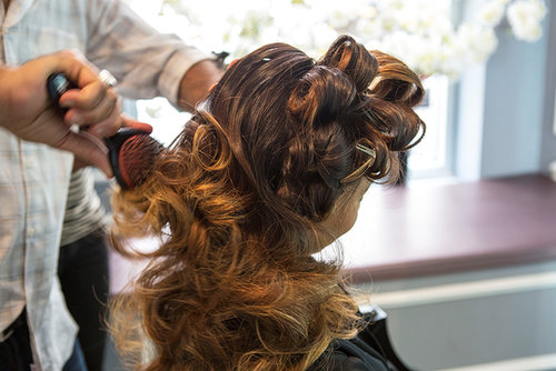 Once your hair has set, take the clips out and brush your curls. "I like to spray the brush with hair spray and brush through the curls," Pipino says. "This helps soften the curls, but with hold." Just keep in mind: the more you brush your hair, the more the curls will fall.
Once your hair has set, take the clips out and brush your curls. "I like to spray the brush with hair spray and brush through the curls," Pipino says. "This helps soften the curls, but with hold." Just keep in mind: the more you brush your hair, the more the curls will fall.