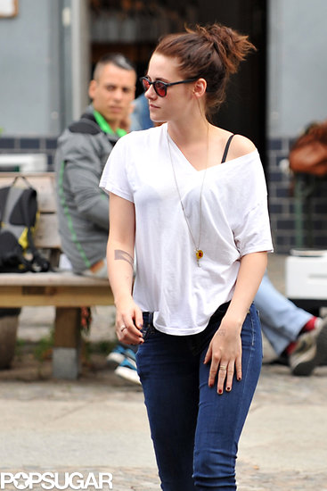 Kristen Stewart showed off her new tattoo while out and about in Berlin with friends.
Kristen Stewart showed off her new tattoo while out and about in Berlin with friends.