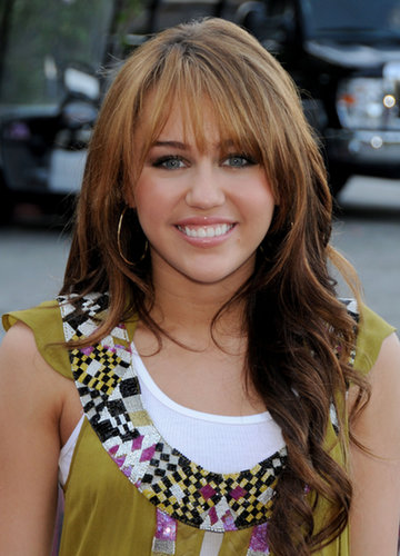 A little more grown-up, a 16-year-old Miley experimented with blunt bangs for a time and began her love affair with black eyeliner.
A little more grown-up, a 16-year-old Miley experimented with blunt bangs for a time and began her love affair with black eyeliner.