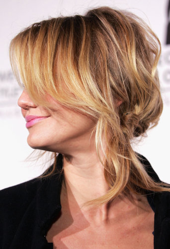 A twisted and knotted side ponytail showed off Cameron's quirky personality at the 2005 Rodeo Walk of Style.
A twisted and knotted side ponytail showed off Cameron's quirky personality at the 2005 Rodeo Walk of Style.