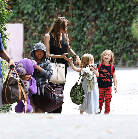 Angelina Jolie and her three kids walked through Santa Barbara over the long weekend.
Angelina Jolie and her three kids walked through Santa Barbara over the long weekend.