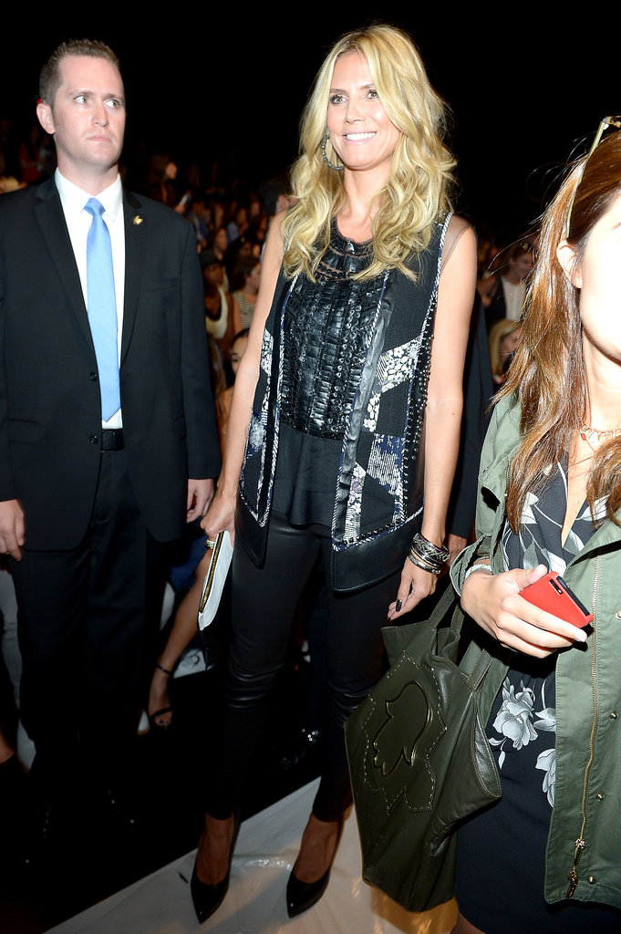 Heidi Klum worked a dark look in an embellished BCBG Max Azria vest with black leather skinny pants at BCBG.
Heidi Klum worked a dark look in an embellished BCBG Max Azria vest with black leather skinny pants at BCBG.