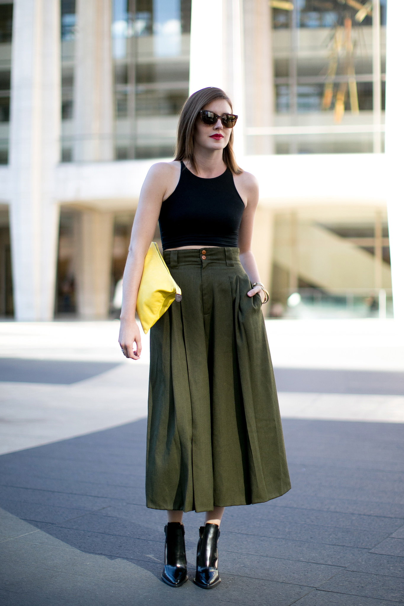 A lesson in pulling off a crop top — without showing too much skin. 
