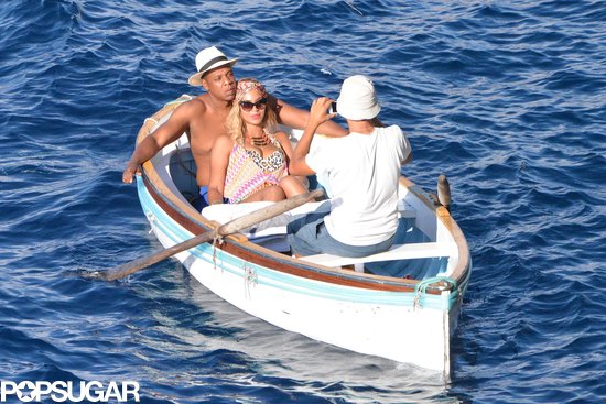 Beyoncé and Jay Z lounged on a canoe and posed for a photo. 
