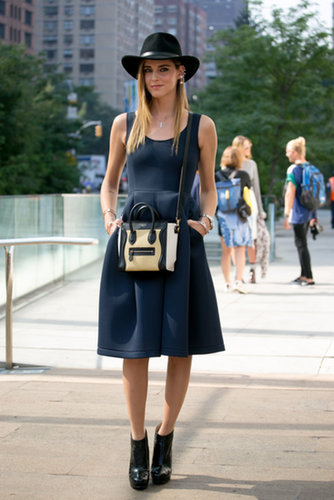 Chiara Ferragni was a bit boho inspired in a wide-brim hat and booties to counter her fit-and-flare dress and Céline bag.
Chiara Ferragni was a bit boho inspired in a wide-brim hat and booties to counter her fit-and-flare dress and Céline bag.