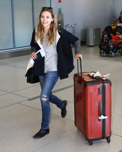 Elizabeth Olsen also arrived in Toronto looking comfy in ripped denim and an oversize jacket.
Elizabeth Olsen also arrived in Toronto looking comfy in ripped denim and an oversize jacket.