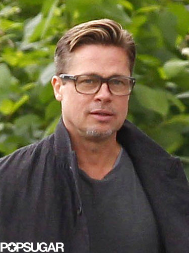 Brad Pitt showed off his short hair in London.
Brad Pitt showed off his short hair in London.