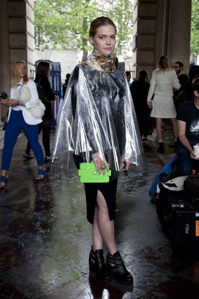 The coolest kind of rainy-day gear, complete with a neon Chanel clutch.
The coolest kind of rainy-day gear, complete with a neon Chanel clutch.