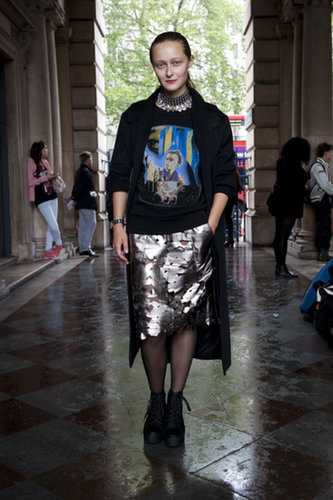 Mismatched-cool, thanks to her graphic tee and metallic pencil skirt.
Mismatched-cool, thanks to her graphic tee and metallic pencil skirt.